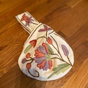 NWOT. Embroidered wrist purse